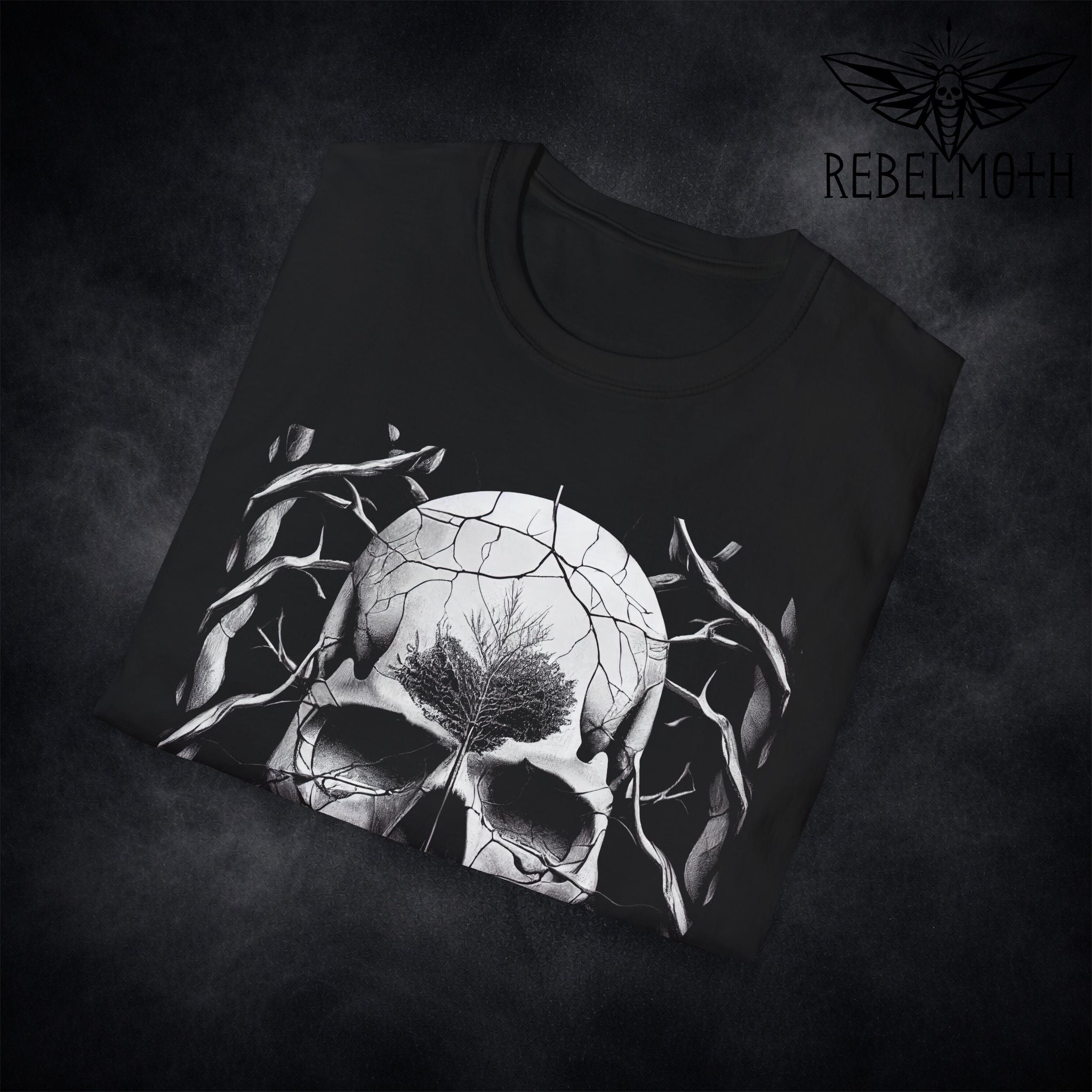 Close-up of skull tree tattoo graphic showing cracked texture and branch framing