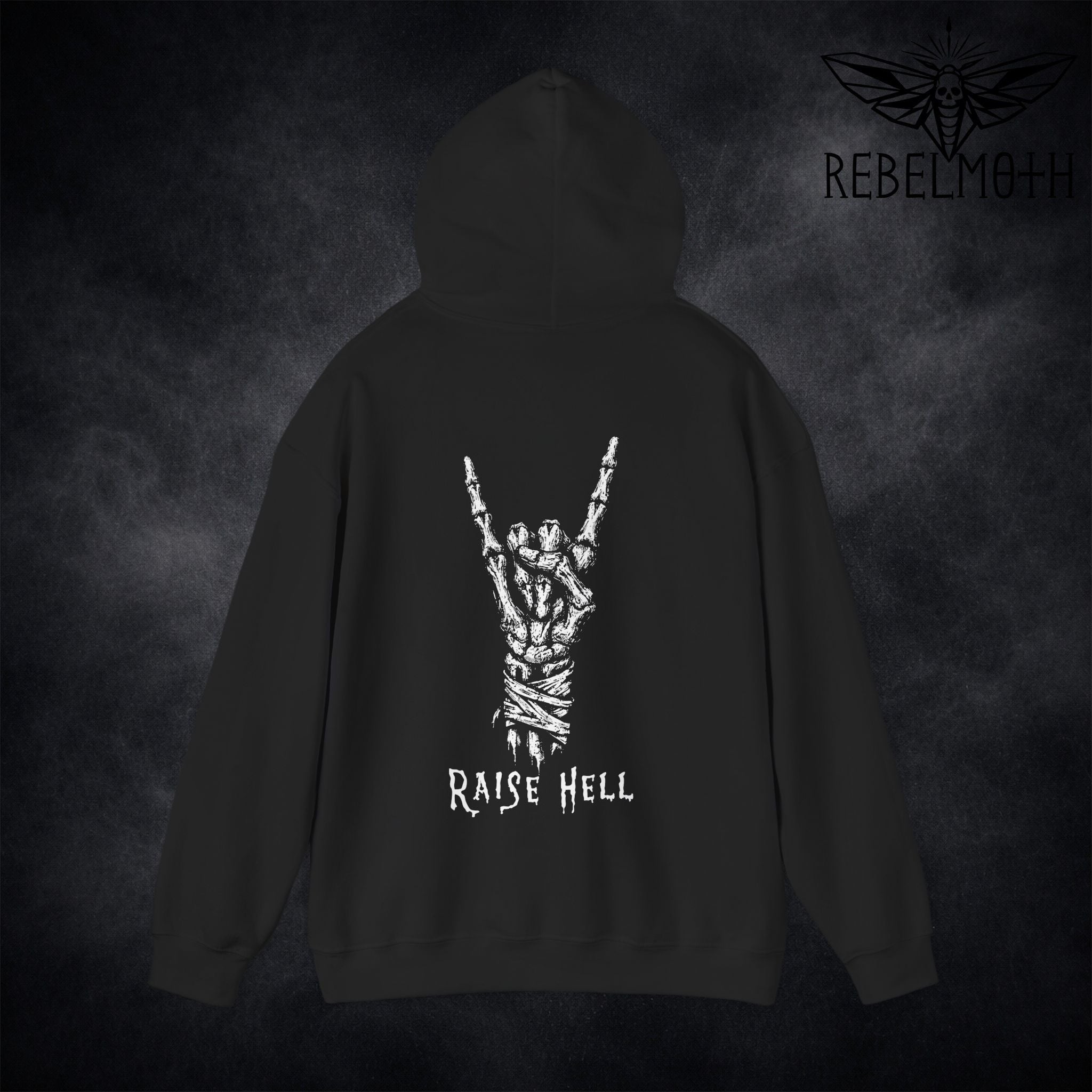 Black metal hoodie with devil horns skeleton hand design and 'Raise Hell' text on the back