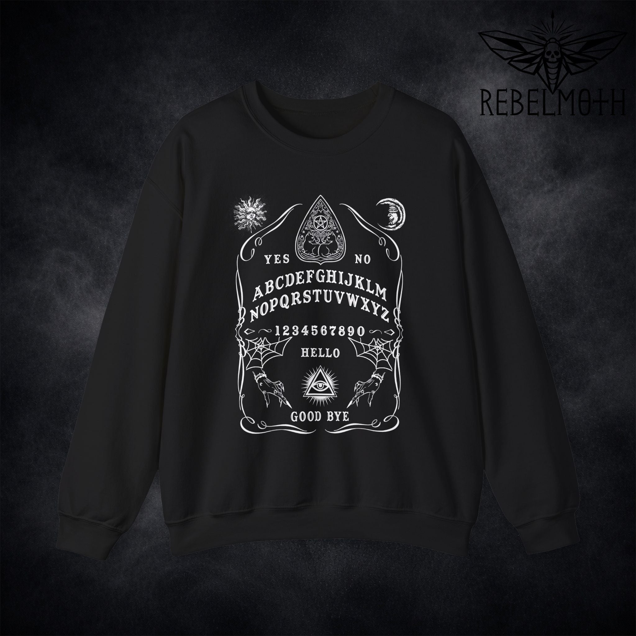 Black sweatshirt with white Ouija board design on a dark background