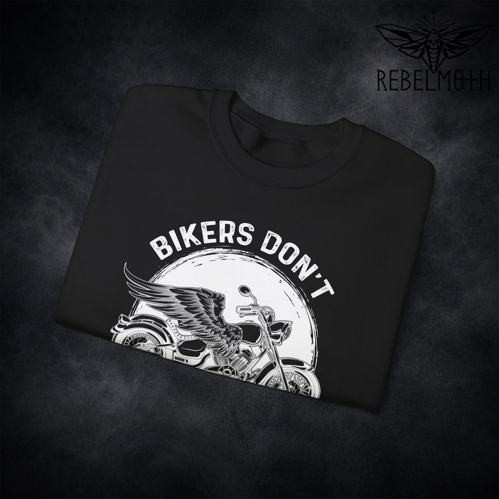 Close-up of motorcycle graphic and “we turn chrome” text on biker sweatshirt