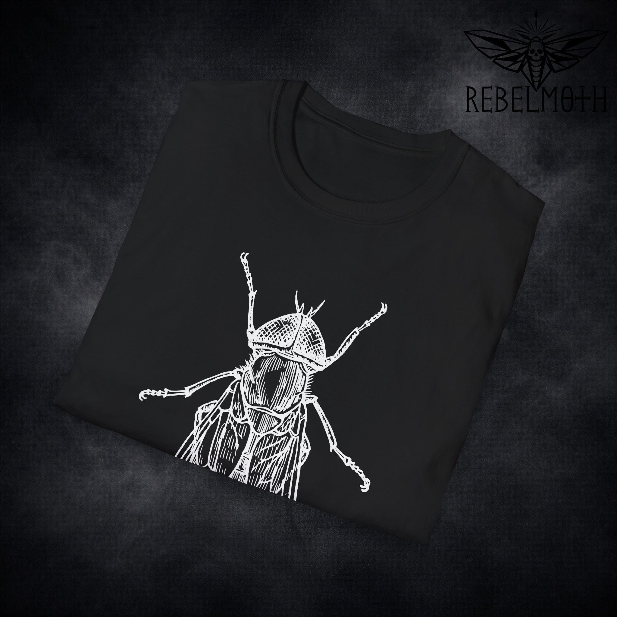 Close-up of house fly line art insect print on black t-shirt