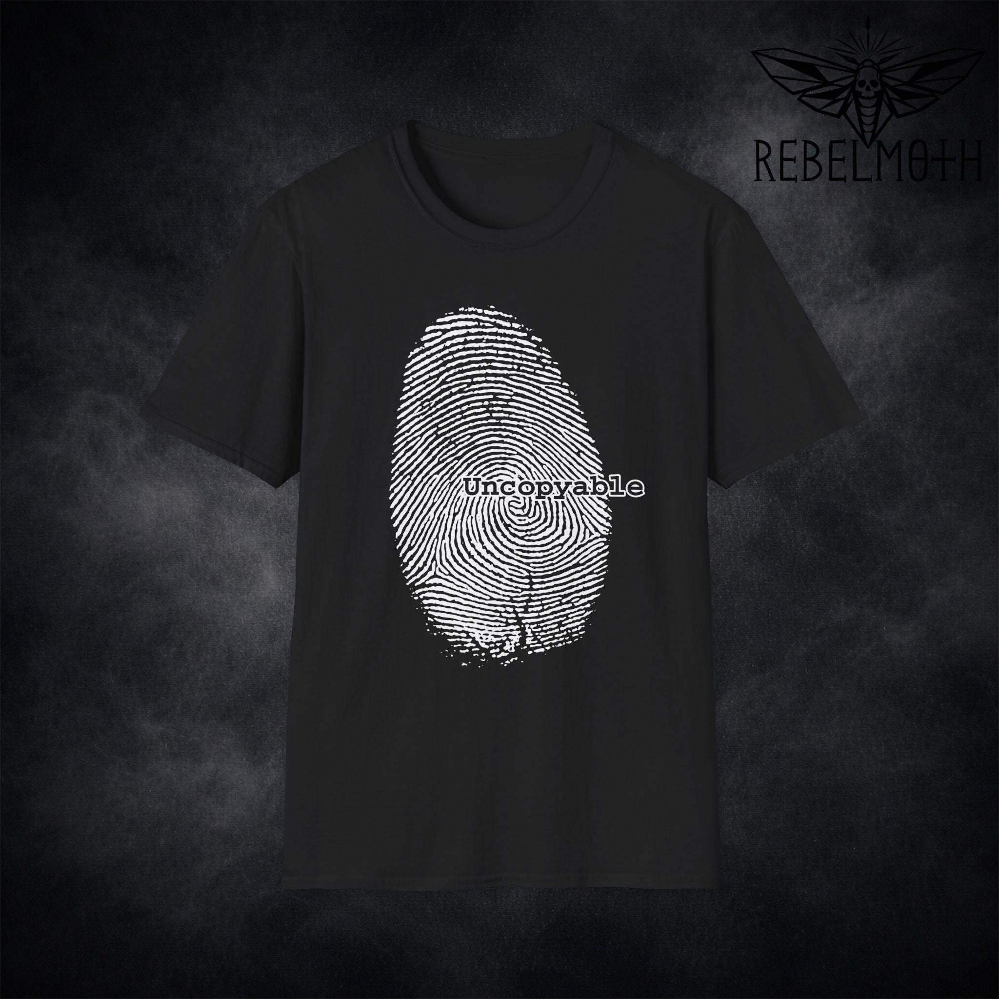 Black grunge t-shirt with a white fingerprint design and 'Uncopyable' text.