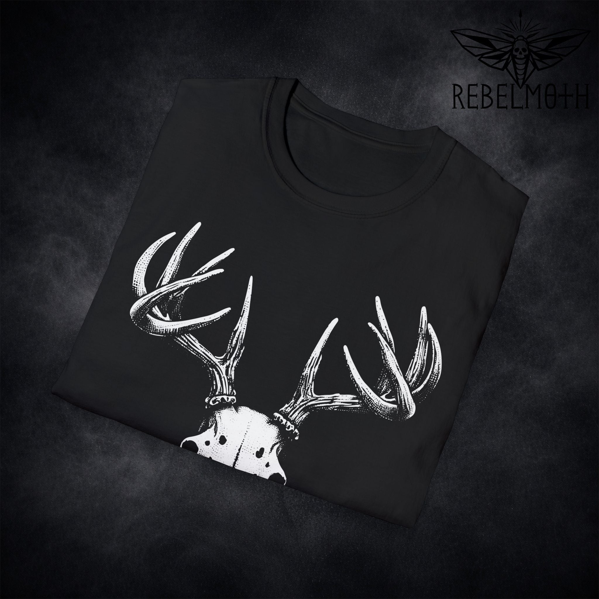 Close-up of deer skull stag antlers print with high-contrast gothic detail on t-shirt
