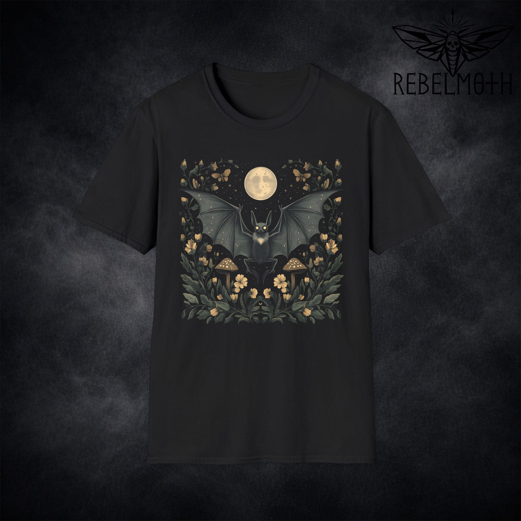 Black t-shirt with pastel goth bat under a full moon surrounded by flowers and mushrooms (floral moon graphic)