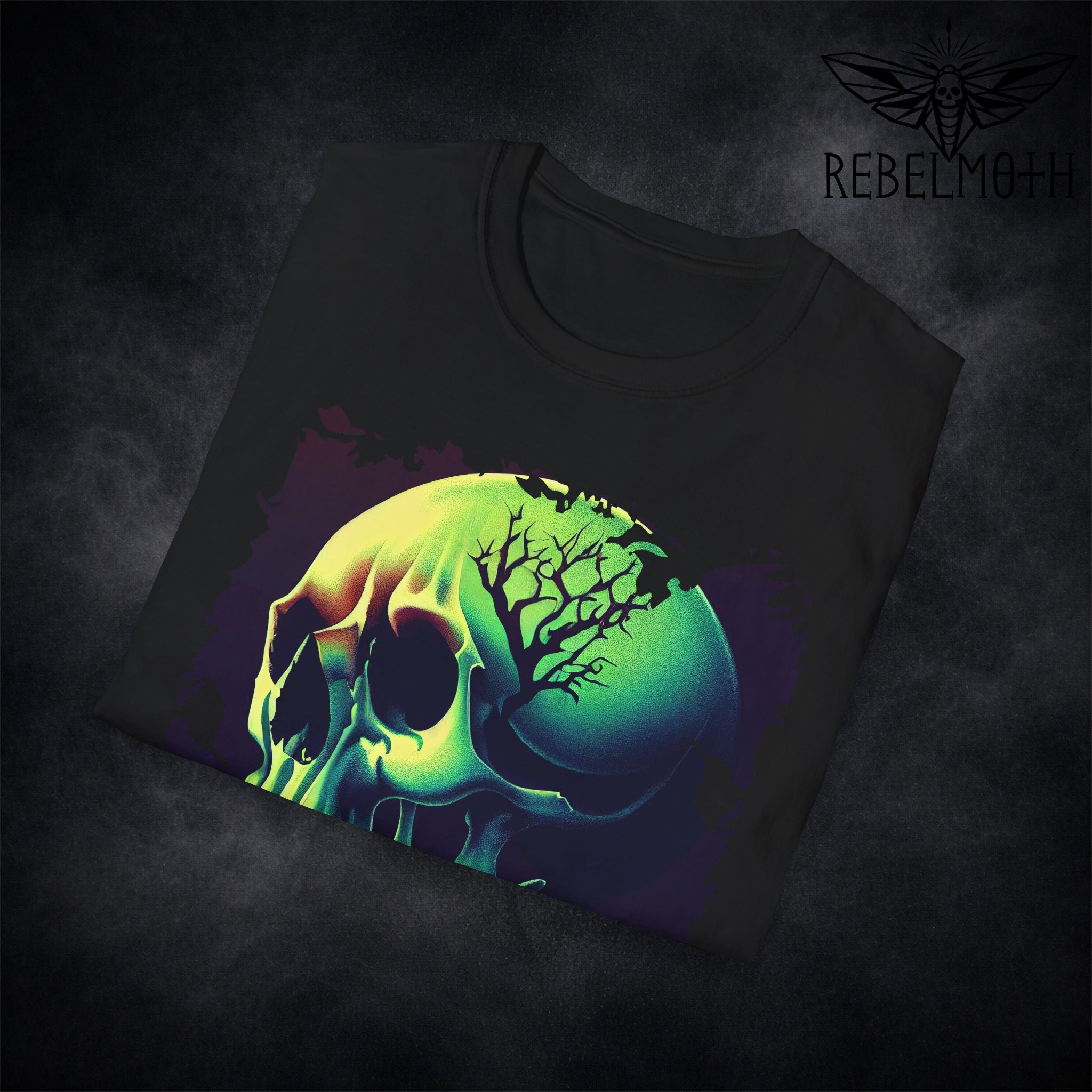 Close-up of neon skull t-shirt showing glowing color gradient and tree silhouette detail