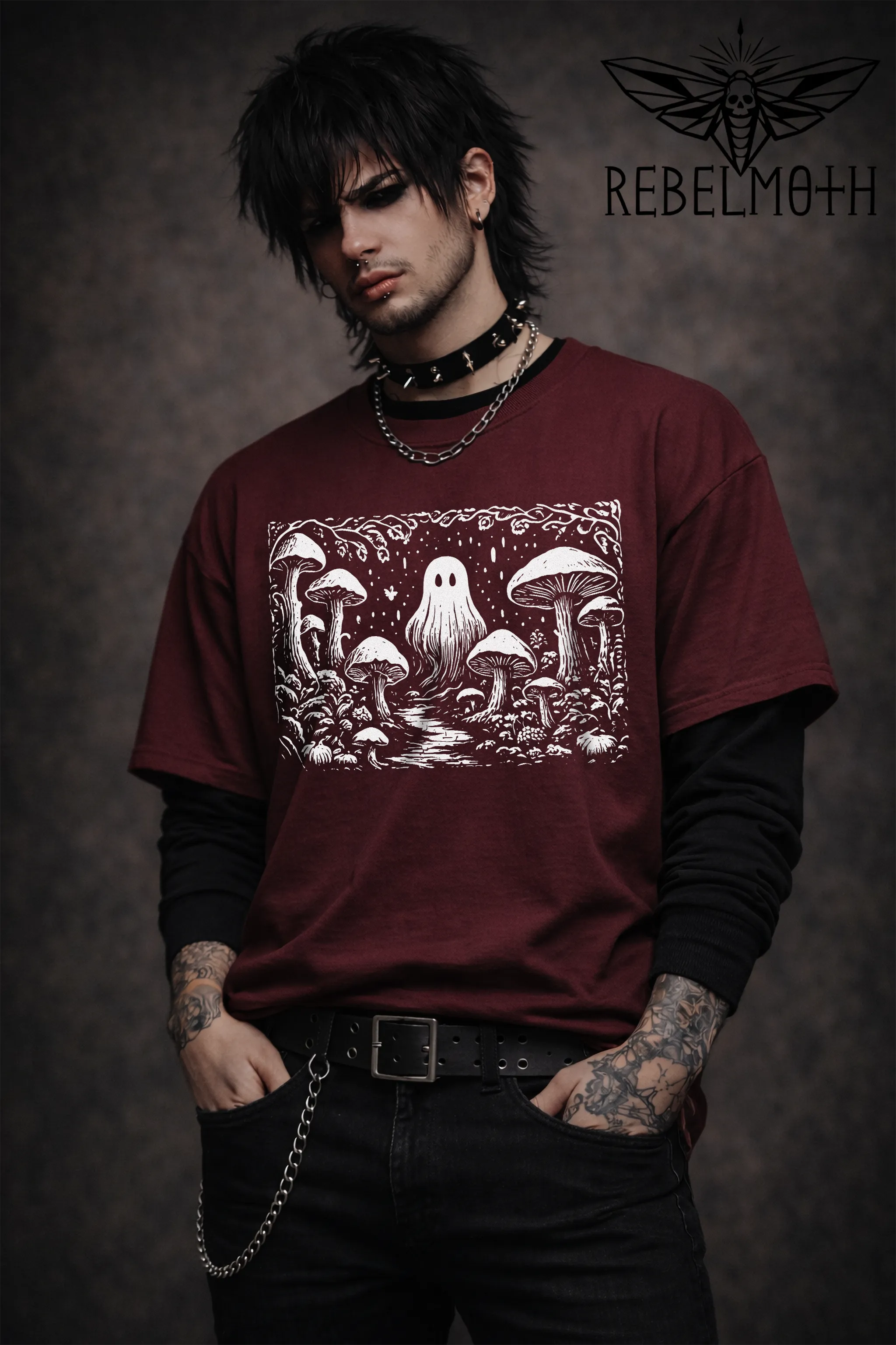 Model wearing a maroon mushroom forest ghost weirdcore linocut goth tee, front view