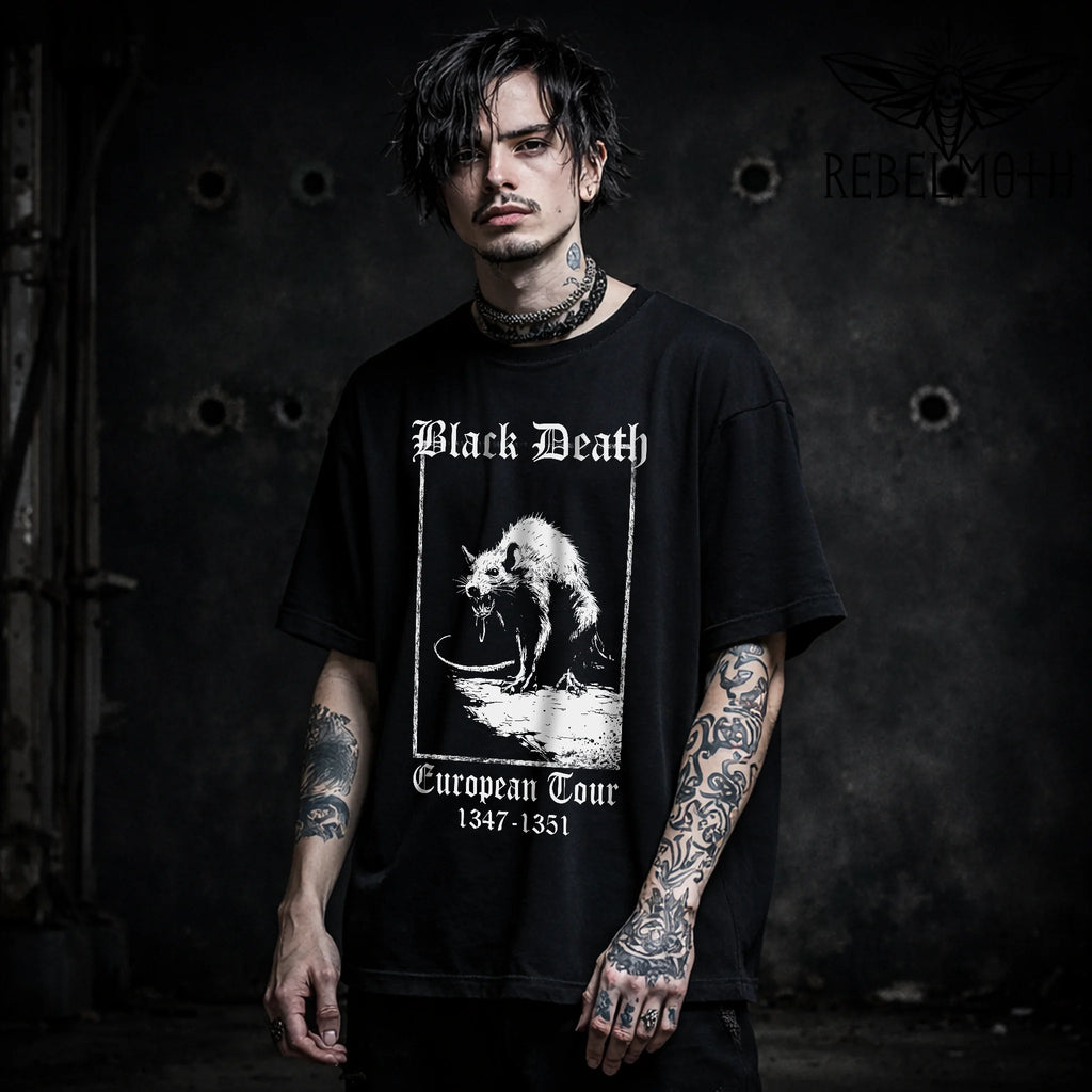 Man wearing a Black t-shirt with “Black Death” plague rat poster graphic and “European Tour 1347–1351”
