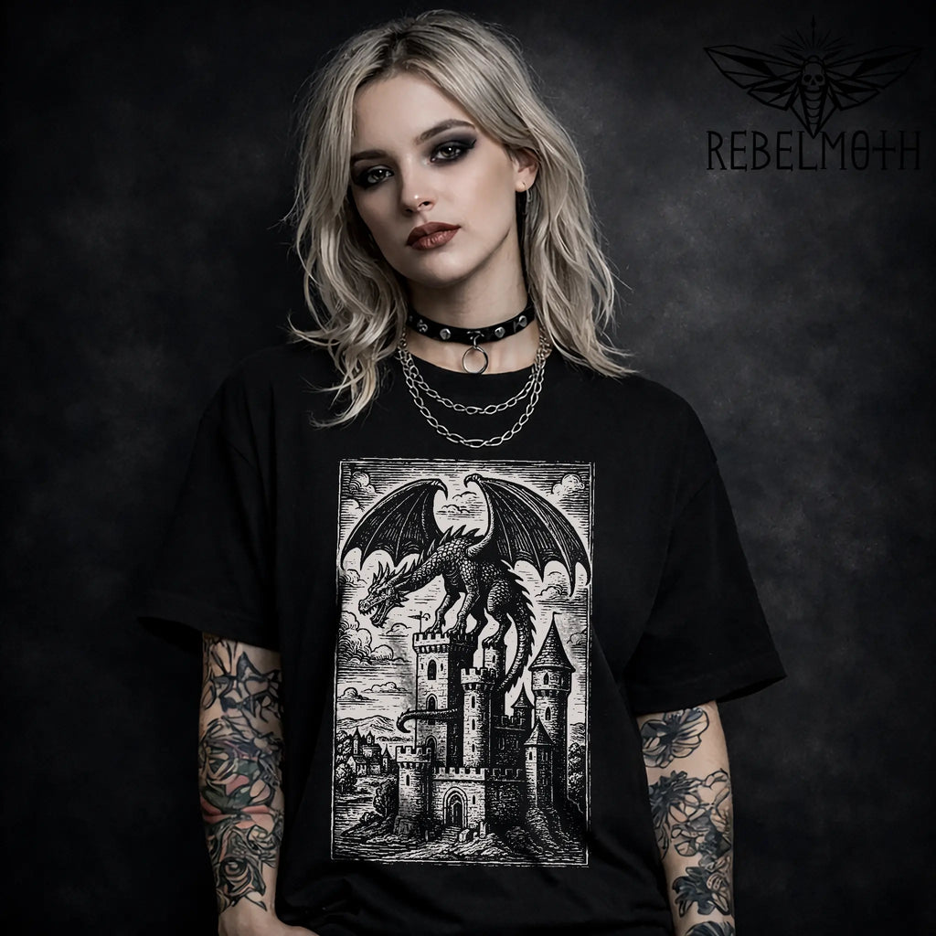 Black t-shirt with woodcut-style dragon perched on a medieval castle graphic (gothic dark fantasy tee)