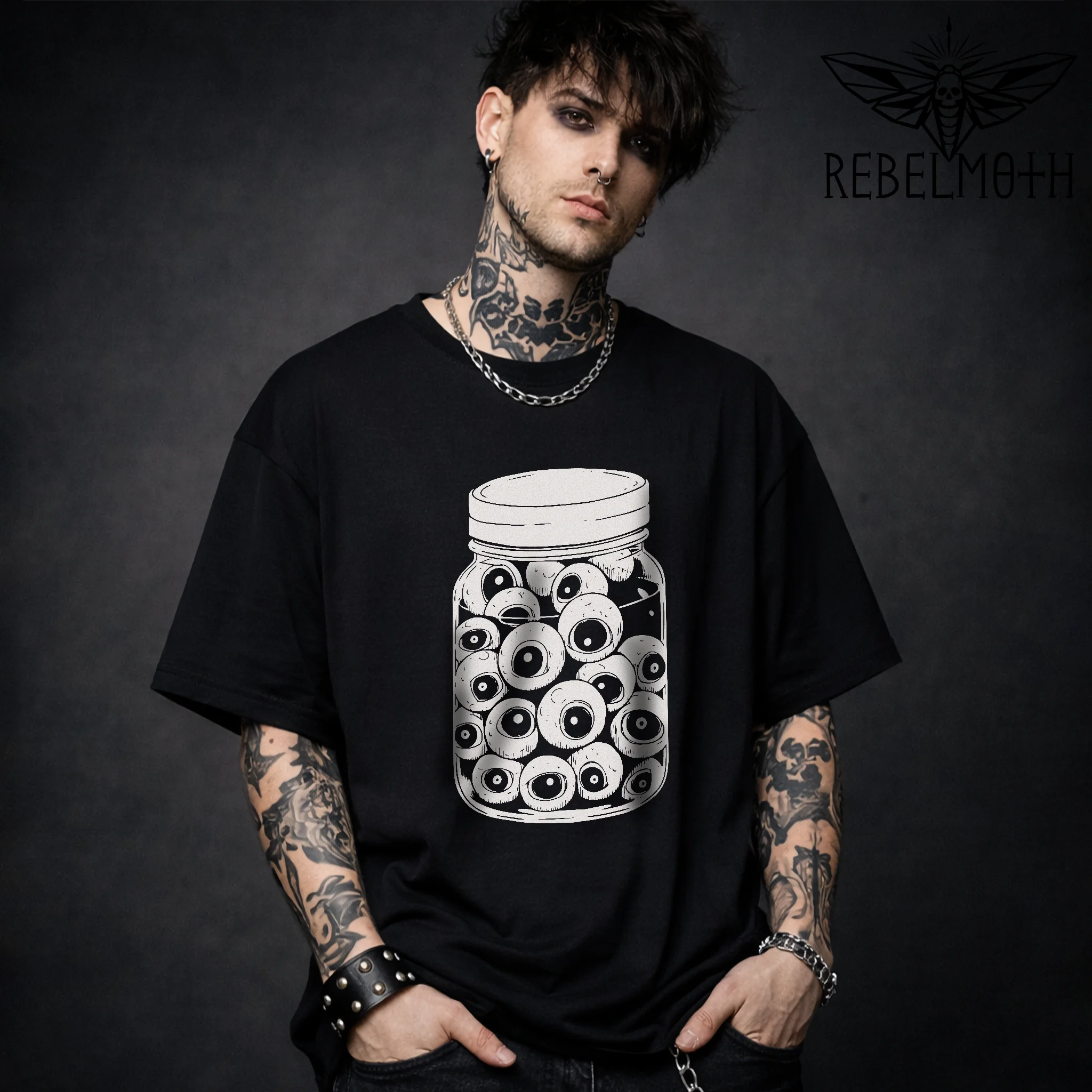 Eyeballs in a jar t-shirt with clean black-and-white line art. Weirdcore, goth-adjacent, trippy grunge graphic tee for alt streetwear fits.