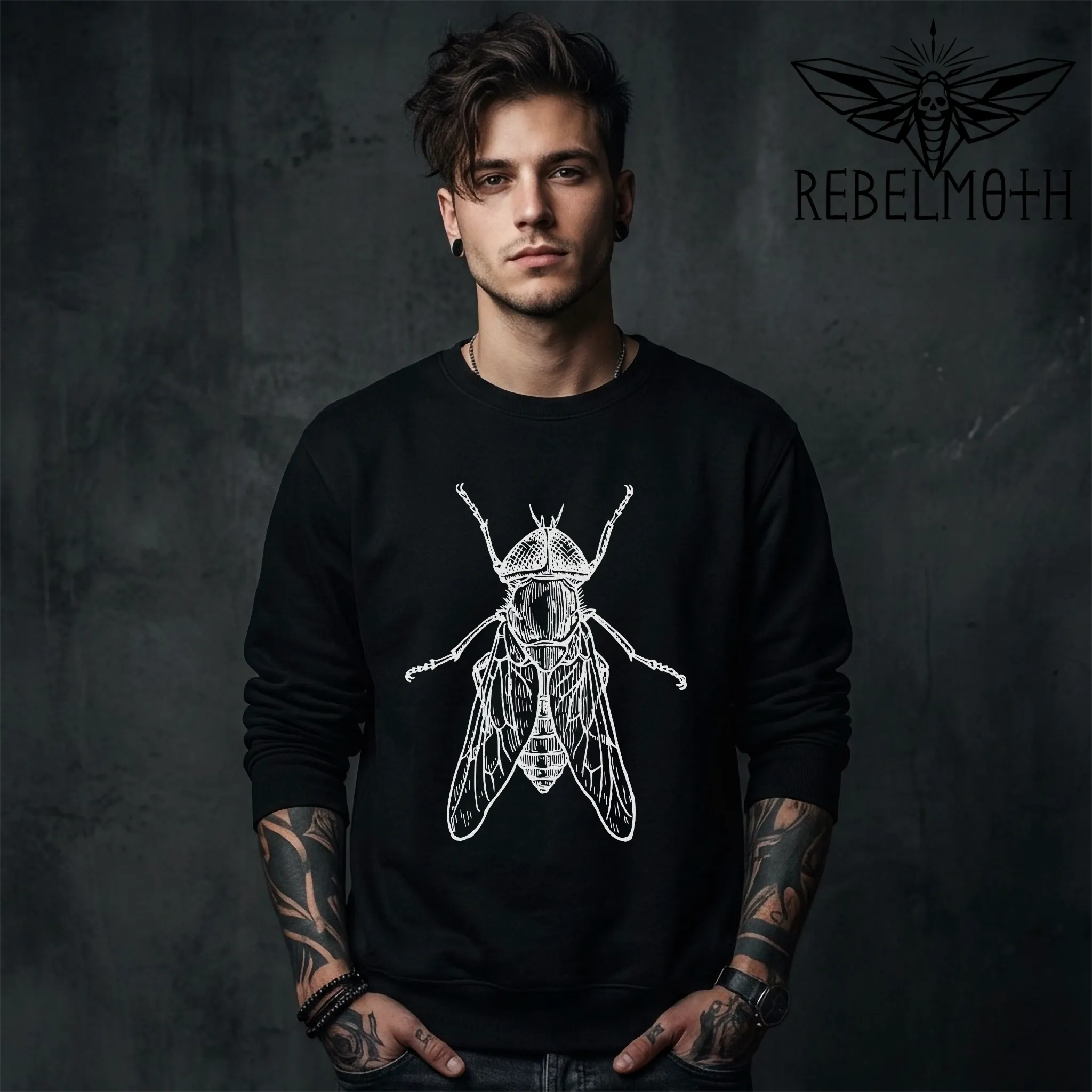 Man wearing Black crewneck sweatshirt with vintage house fly insect illustration graphic in white line art (bug graphic)