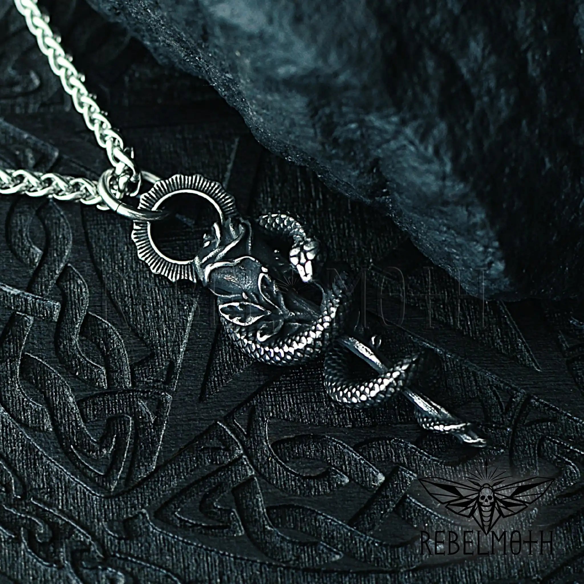 Gothic snake rose necklace in stainless steel with serpent wrapped around rose pendant