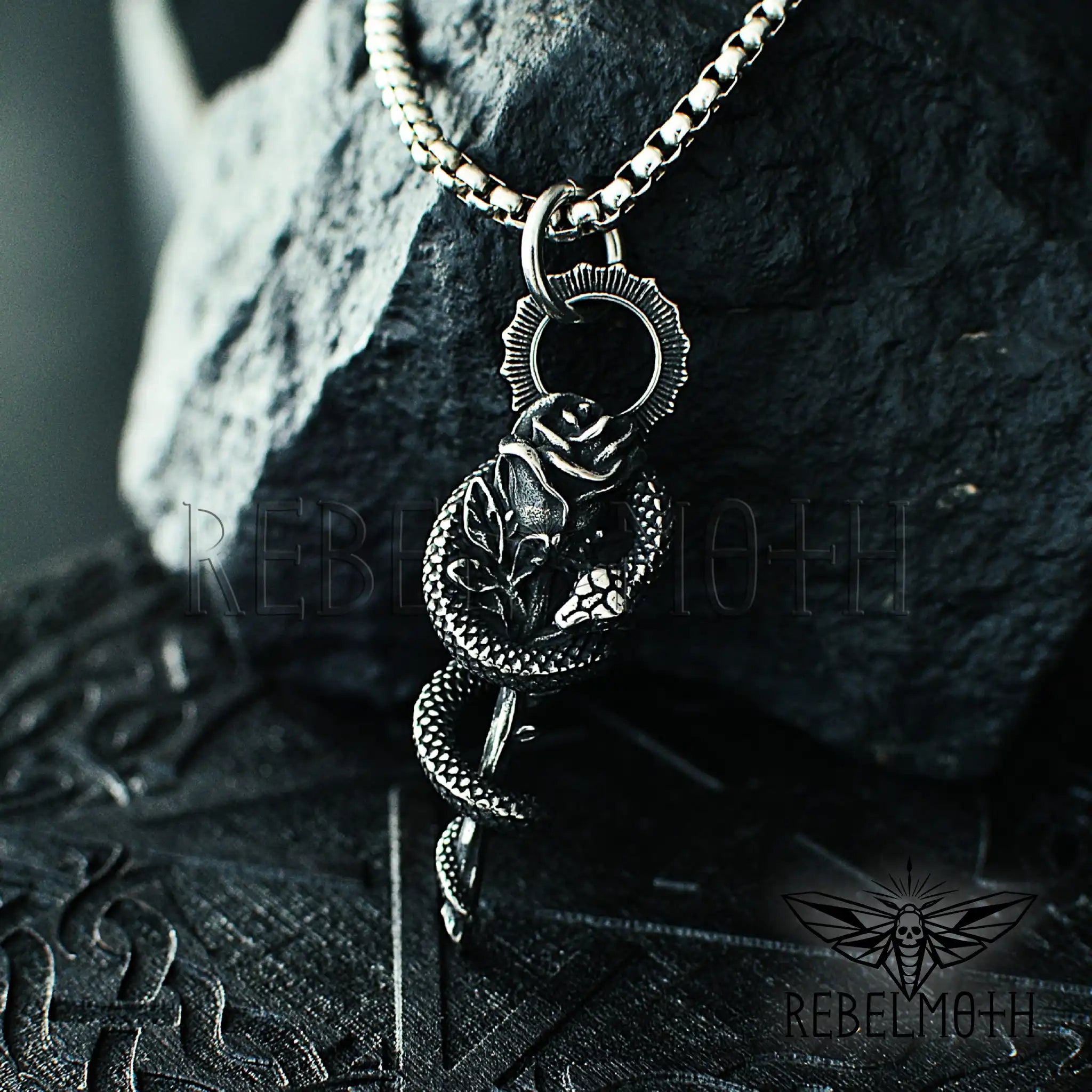 Gothic snake rose necklace in stainless steel with serpent wrapped around rose pendant