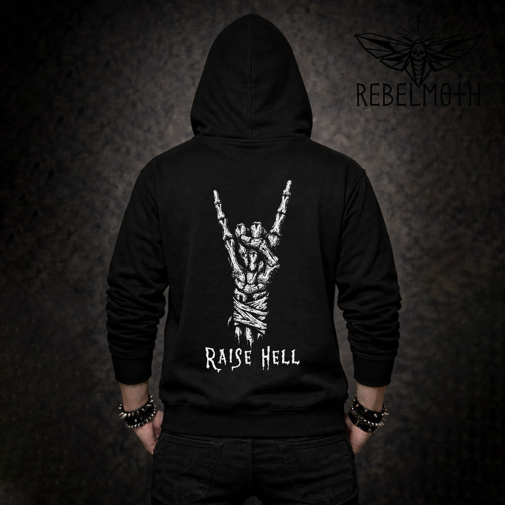 Black metal hoodie with devil horns skeleton hand design and 'Raise Hell' text on the back